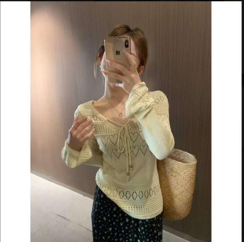 New spring 2025 women's niche lace-up hollow sweater to make you look slim and versatile inside