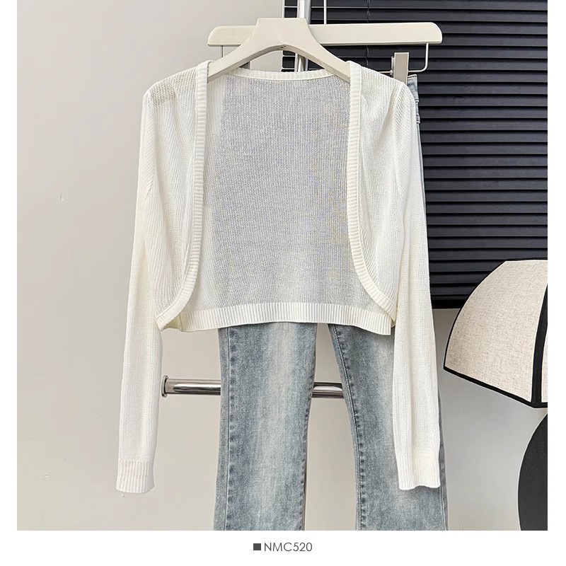 Retro Korean version solid color hollow thin long-sleeved knitted sunscreen cardigan for women in summer vacation style short air conditioning blouse