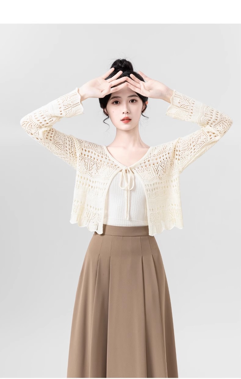 Hollow ice silk knitted cardigan for women in summer 2025 new air conditioning shirt suspender outer sunscreen shirt short top