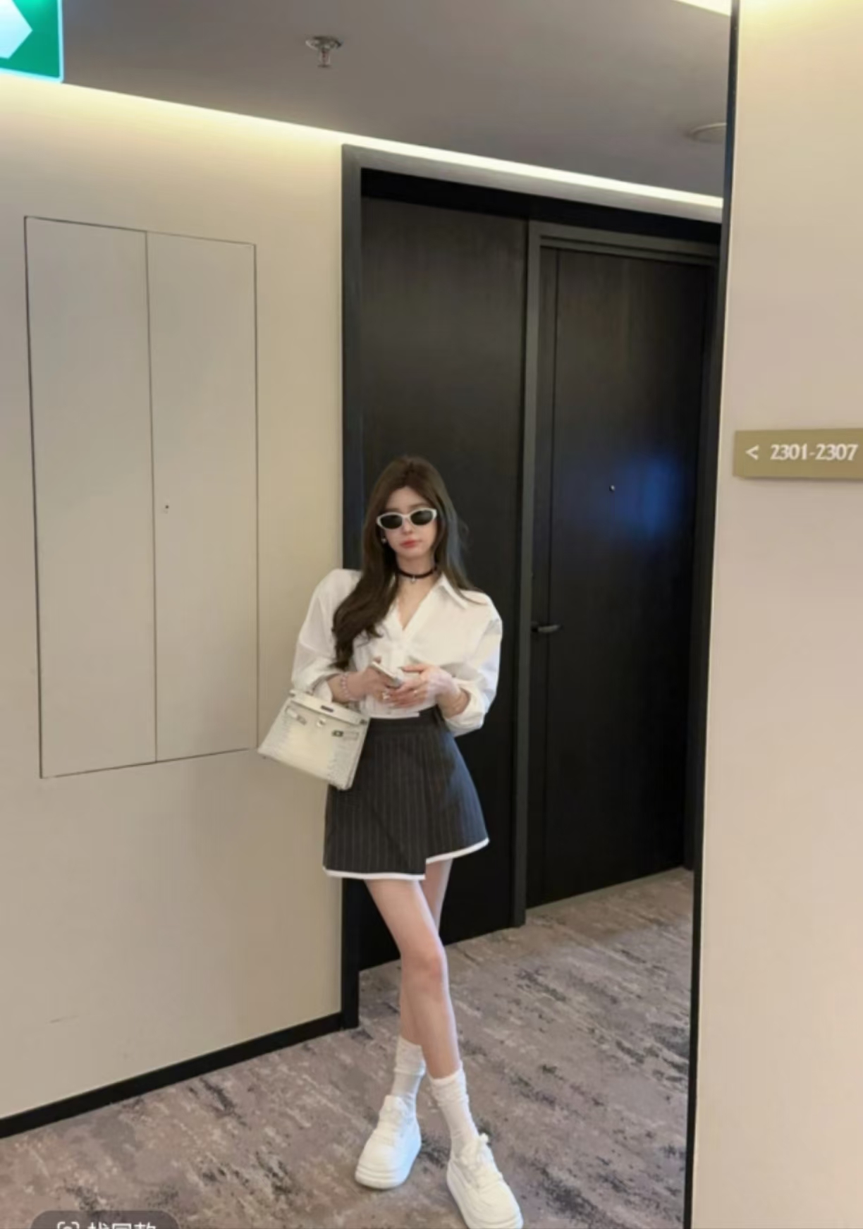 Mina's essential white shirt, custom lace-edged white shirt + vertical irregular suit skirt