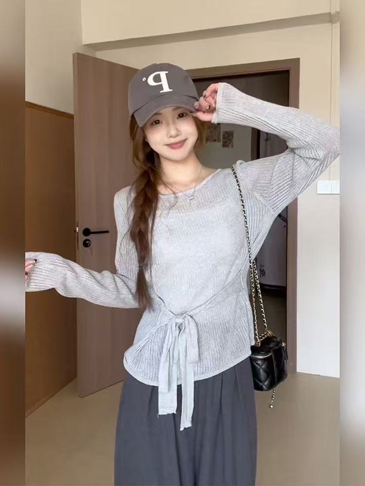 Hollow strap long-sleeved sweater for women early spring 2025 new waist-hugging style high-end blouse top