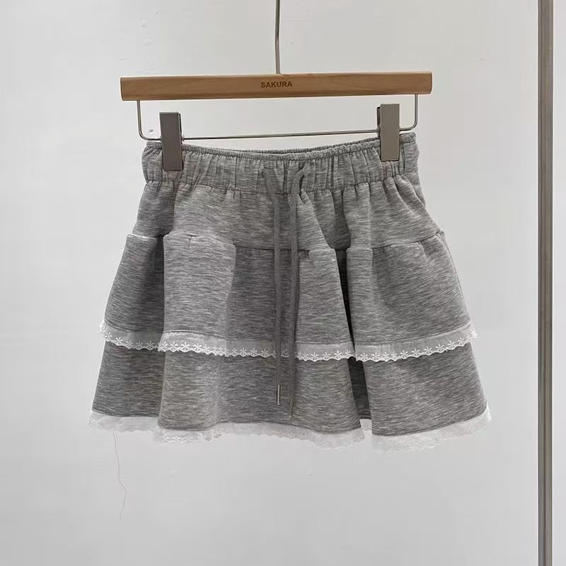Korean chic Korean pure sweet and spicy ruffled half-length skirt for women in summer, loose loose and tight waist cake skirt