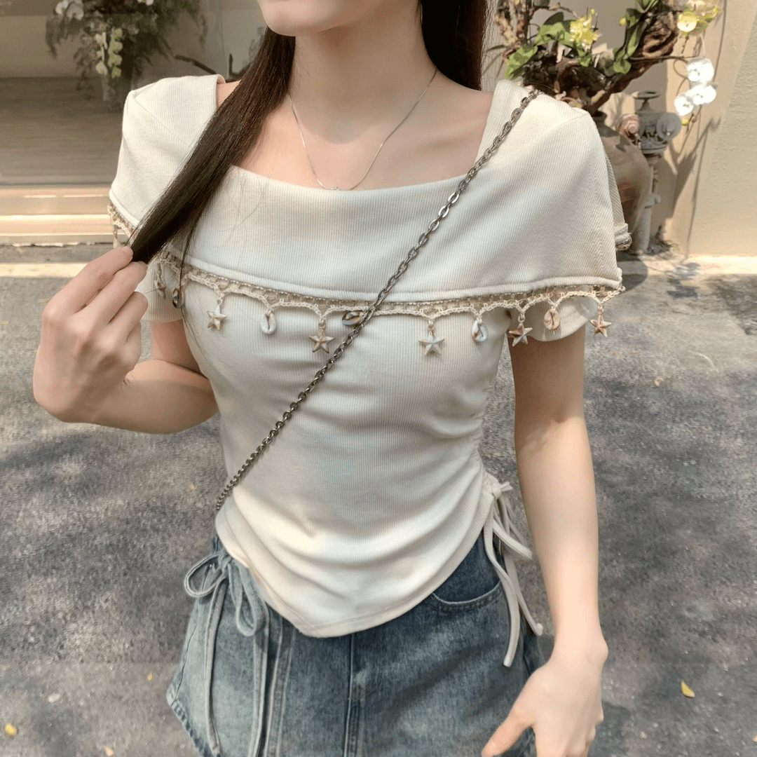 Xiaoqijia's new spring French tassel design and sweet slim short top