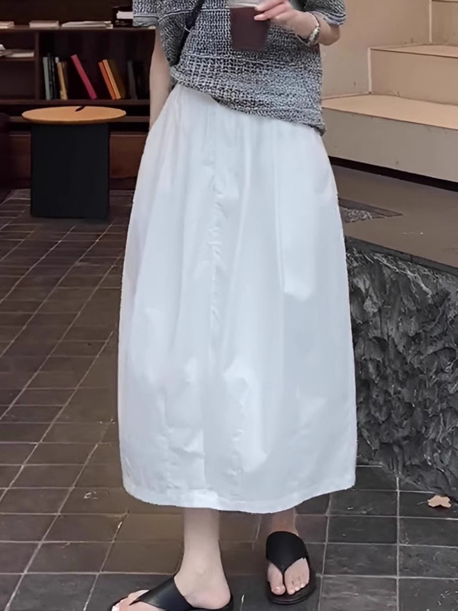 Japanese white A-line skirt for women 2025 new summer high-waist loose design and slim umbrella skirt