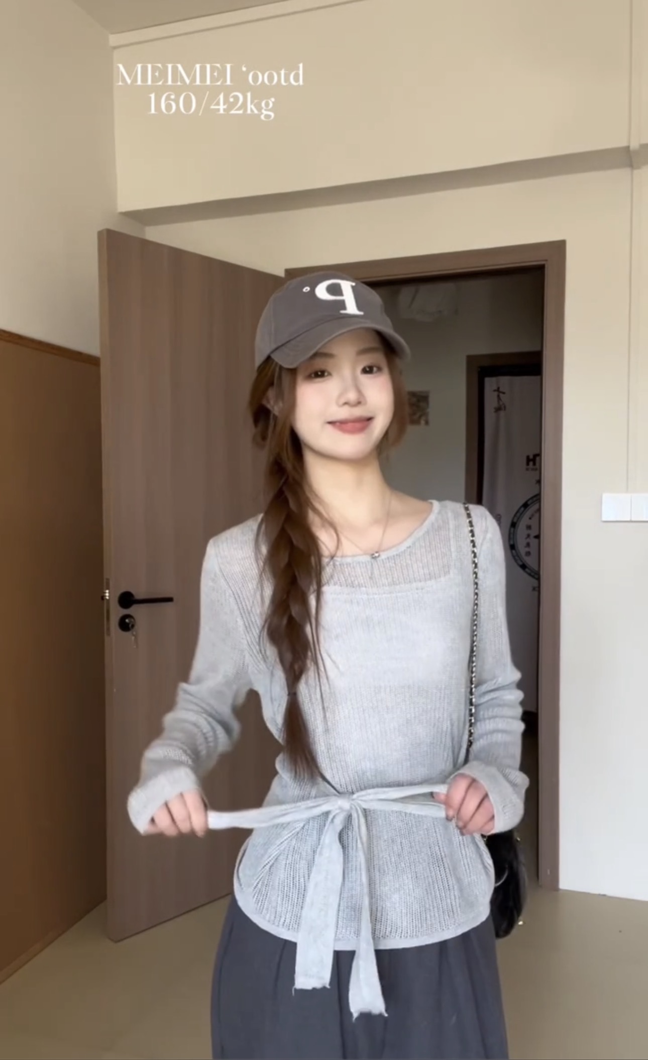 French hollow strap long-sleeved sweater for women early spring 2025 new waist-hugging style high-end blouse top