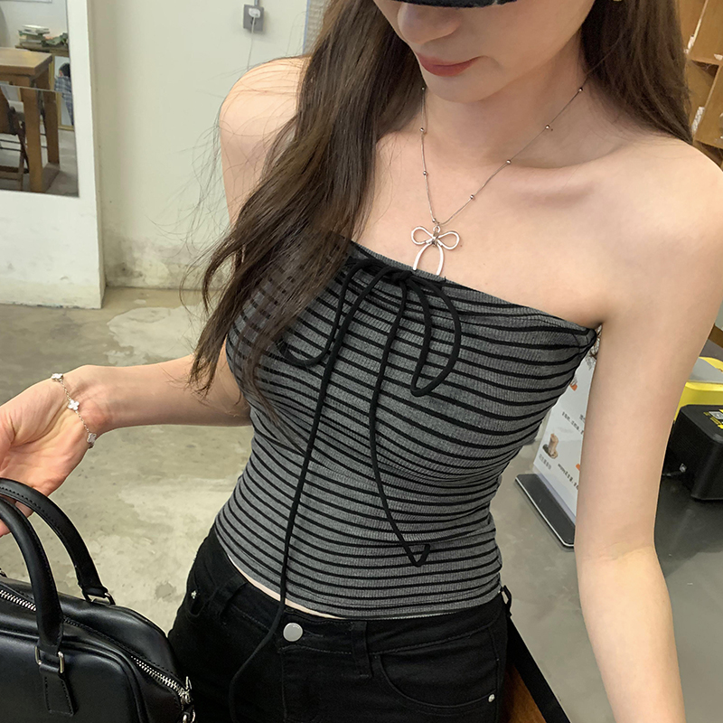Real photo of striped strap strap sling vest for women wearing a summer outdoors with a unique and beautiful Thai design top