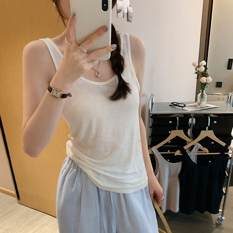 Real photo of women wearing a simple slim fit and versatile sleeveless T-shirt top for summer