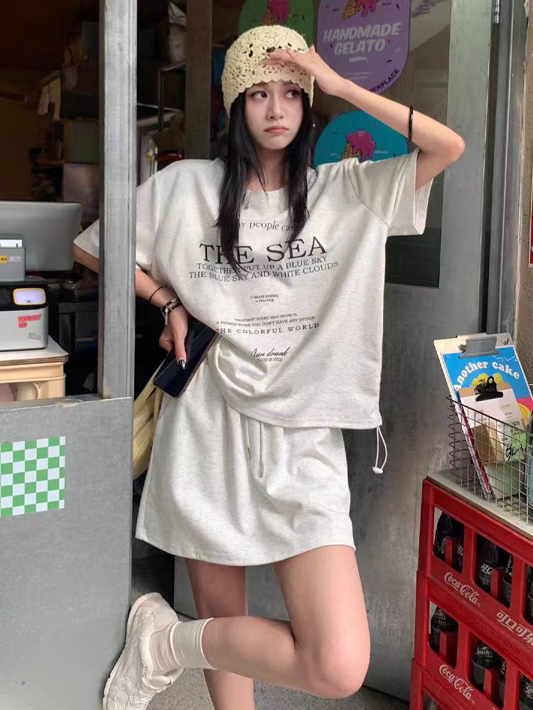 韓版休閒運動風套裝女夏季寬鬆減齡抽繩短袖包臀A字短裙兩件套潮