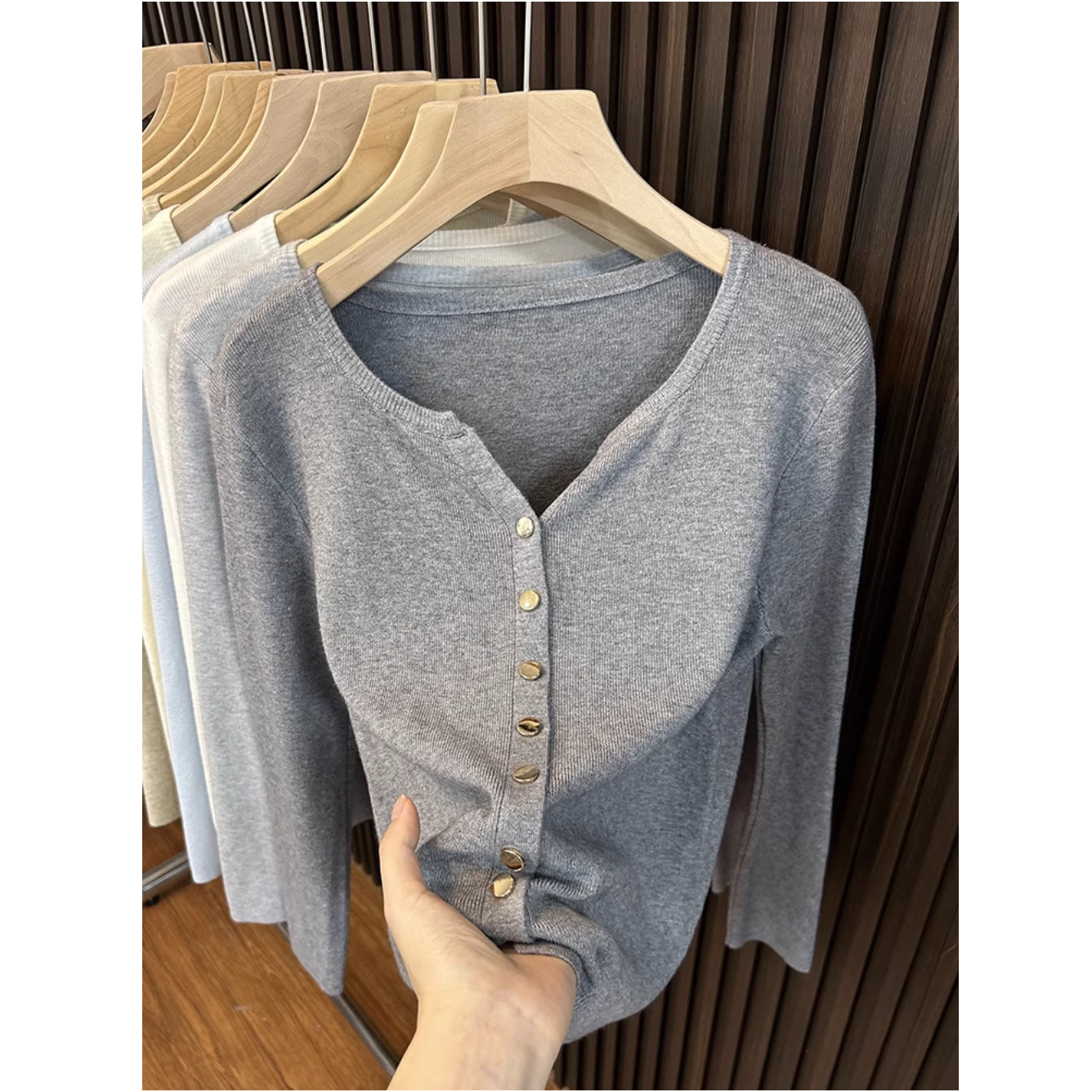 Solid color metal button V-neck long-sleeved sweater cardigan for women in autumn and winter simple temperament new soft and versatile top
