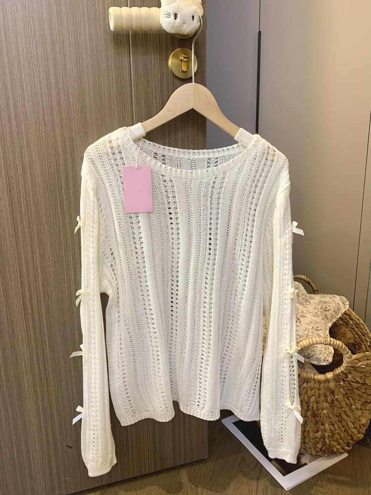 Three-dimensional bow hollow sunscreen blouse for women in summer new lazy style loose thin style sweater top