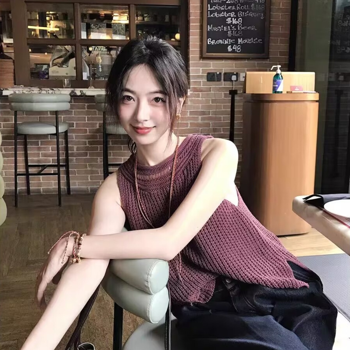 Retro linen cotton knitted suspender vest for women on summer vacation wearing loose and lazy hollow atmosphere sleeveless top
