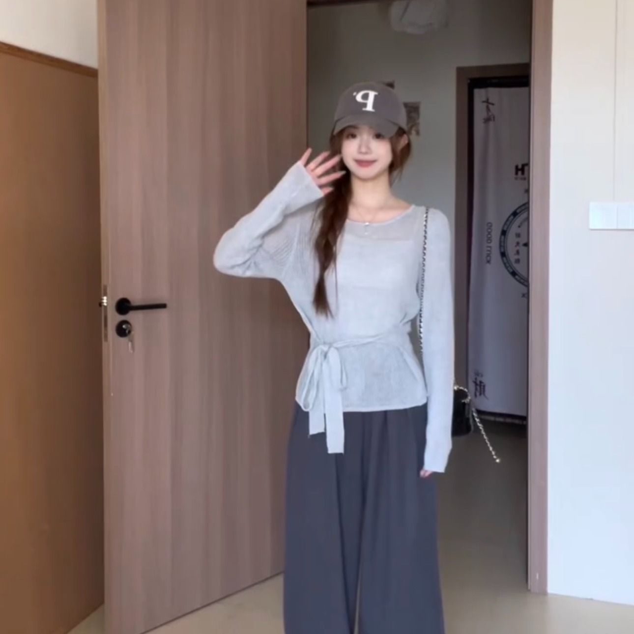 French hollow strap long-sleeved sweater for women early spring 2025 new waist-hugging style high-end blouse top