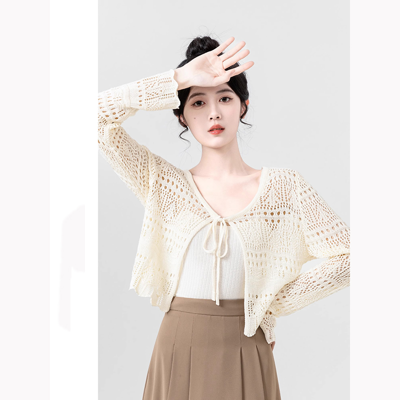 Hollow ice silk knitted cardigan for women in summer 2025 new air conditioning shirt suspender outer sunscreen shirt short top