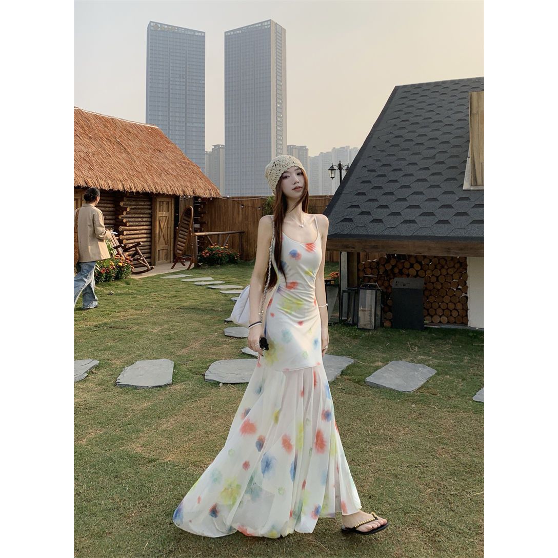 Seaside vacation feng watercolor suspender dress for women in spring and summer small long irregular hip fishtail skirt new style
