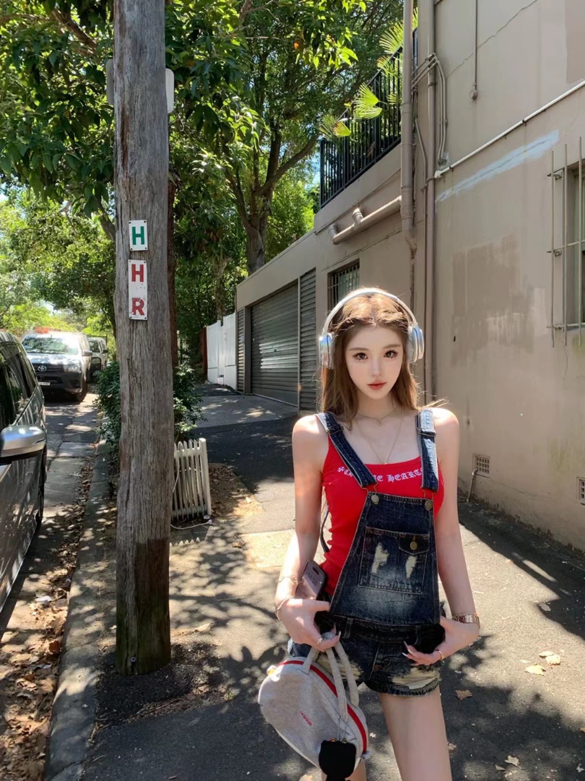 American retro denim overalls for women in spring and summer small temperament Korean slim design ripped jumpsuits