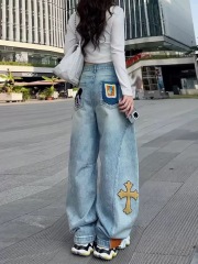 Cartoon light blue embroidered sickle banana jeans for women 2025 spring new fashion trend scimitar wide-leg pants