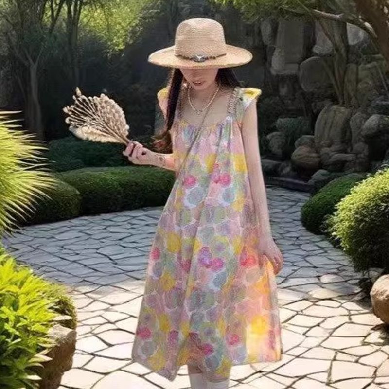 Loose and slim and beautiful Japanese seaside vacation temperament floral dress French retro bow skirt