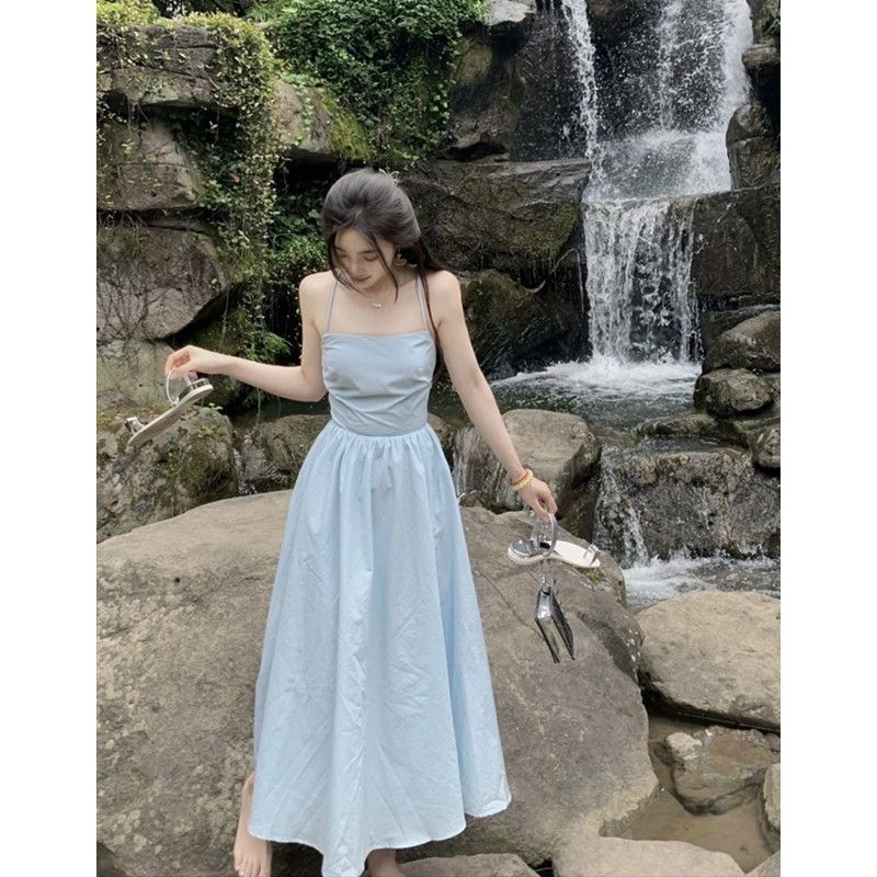 海邊度假風連衣裙女夏季設計感露背綁帶a字長裙法式氣質吊帶裙子