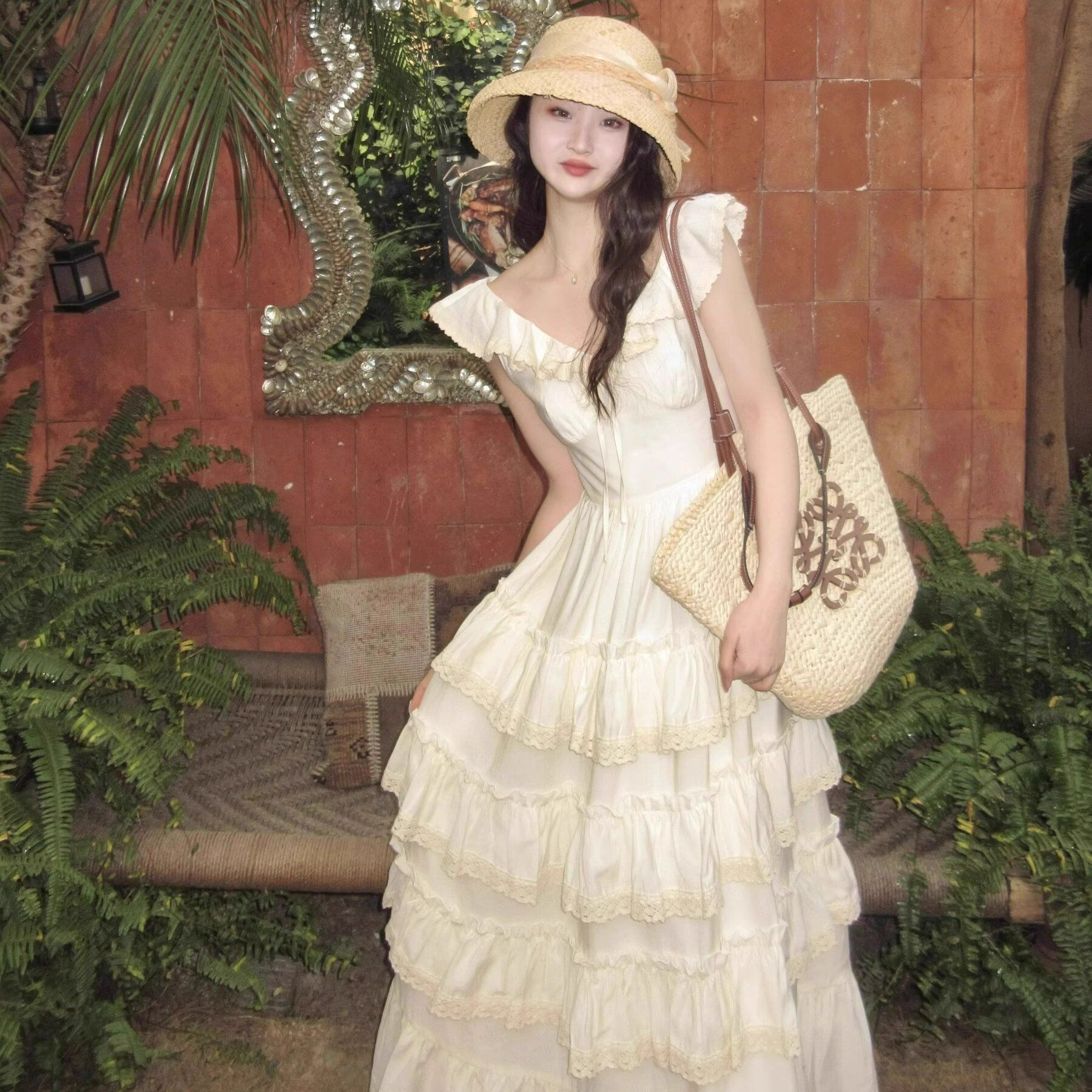 High-end exquisite small flying sleeve apricot cake dress 2025 spring and summer retro palace style suspender long skirt for women