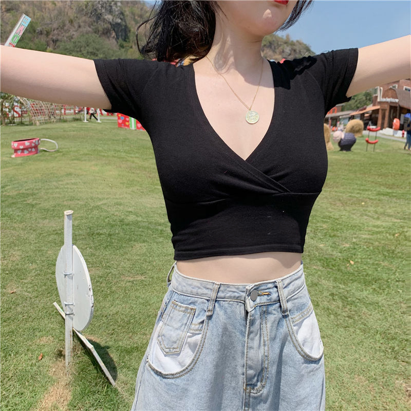 Foreign trade original short-sleeved T-shirt for women in summer deep V-neck, low-cut Korean version slim-fitting short navel