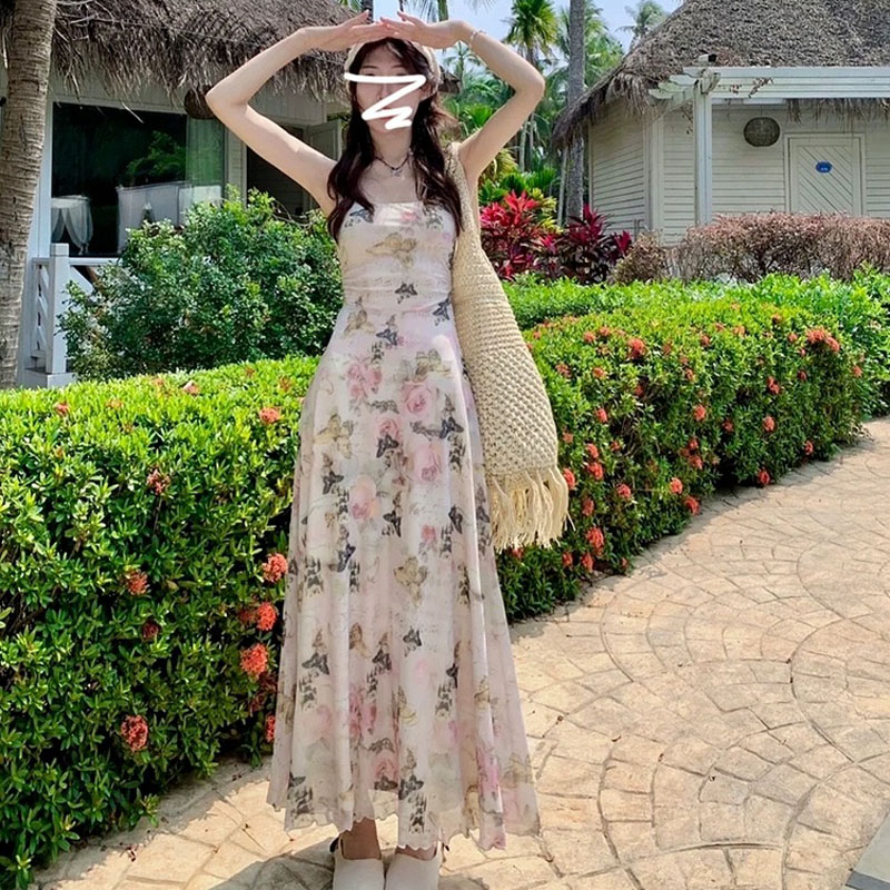 Coffee break French temperament waist-hugging A-line floral dress for women summer long skirt 2025 new vacation suspender skirt