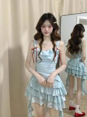 Seaside vacation blue suspender dress for women in summer 2025 new irregular waist-hugging princess cake puffy skirt