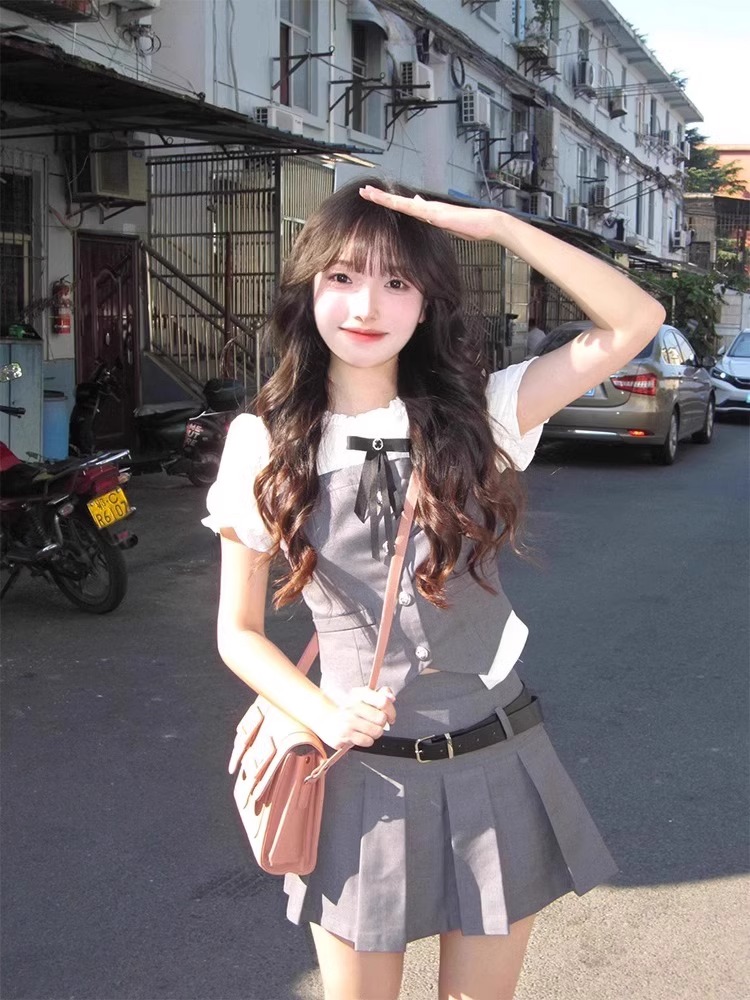 American college style suit summer sweet and cool hot girl fake two-piece spliced ​​short shirt slim pleated skirt two-piece set