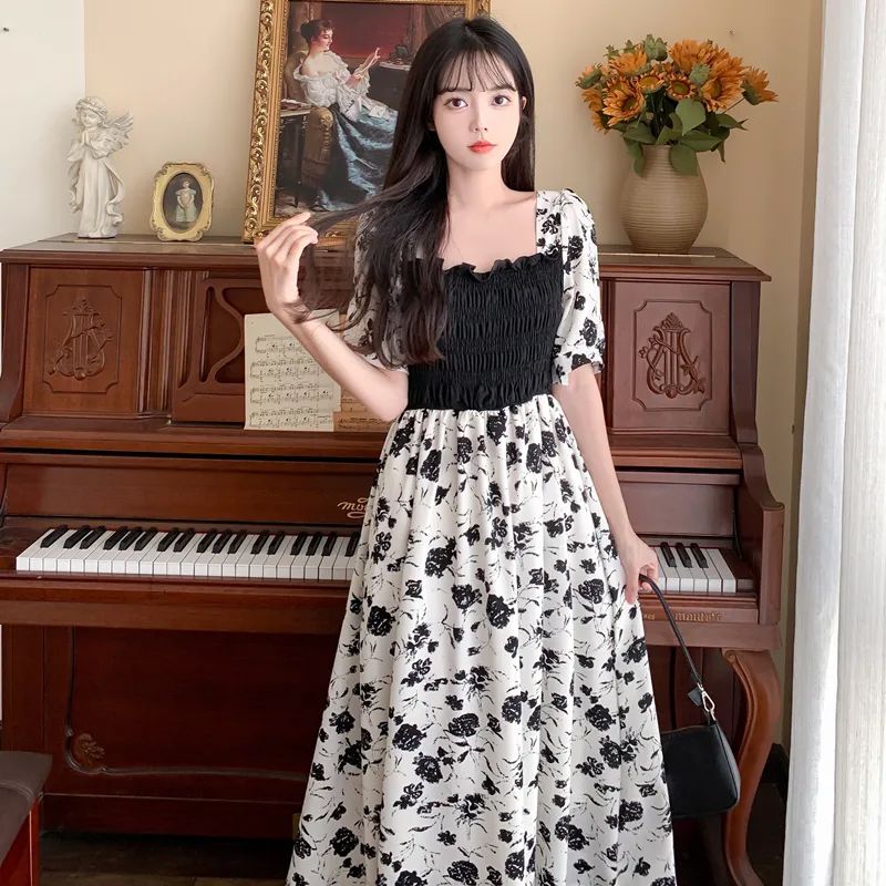 Four-sided French puff sleeves 2025 waist-hugging and slimming medium-length floral skirt for women over-knee dress ins