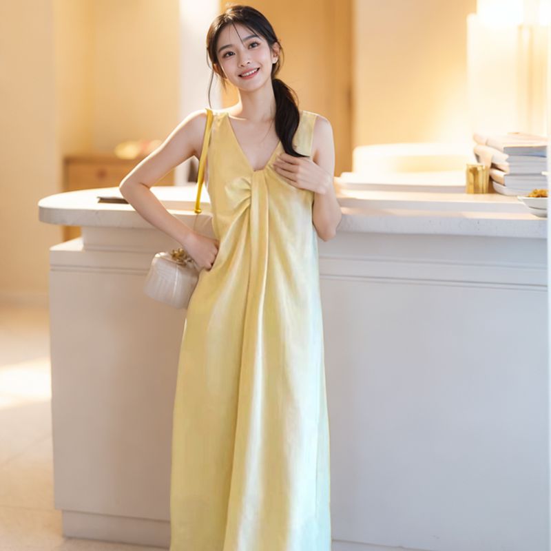 French-style temperament design sense twisted V-neck sleeveless backless dress for women, fashionable and sweet Korean version loose and slimming A-line long dress