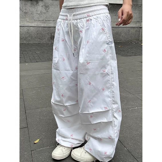 美式復古蝴蝶結滿印傘兵褲女春夏闊腿潮抽繩褶皺工裝休閒長褲