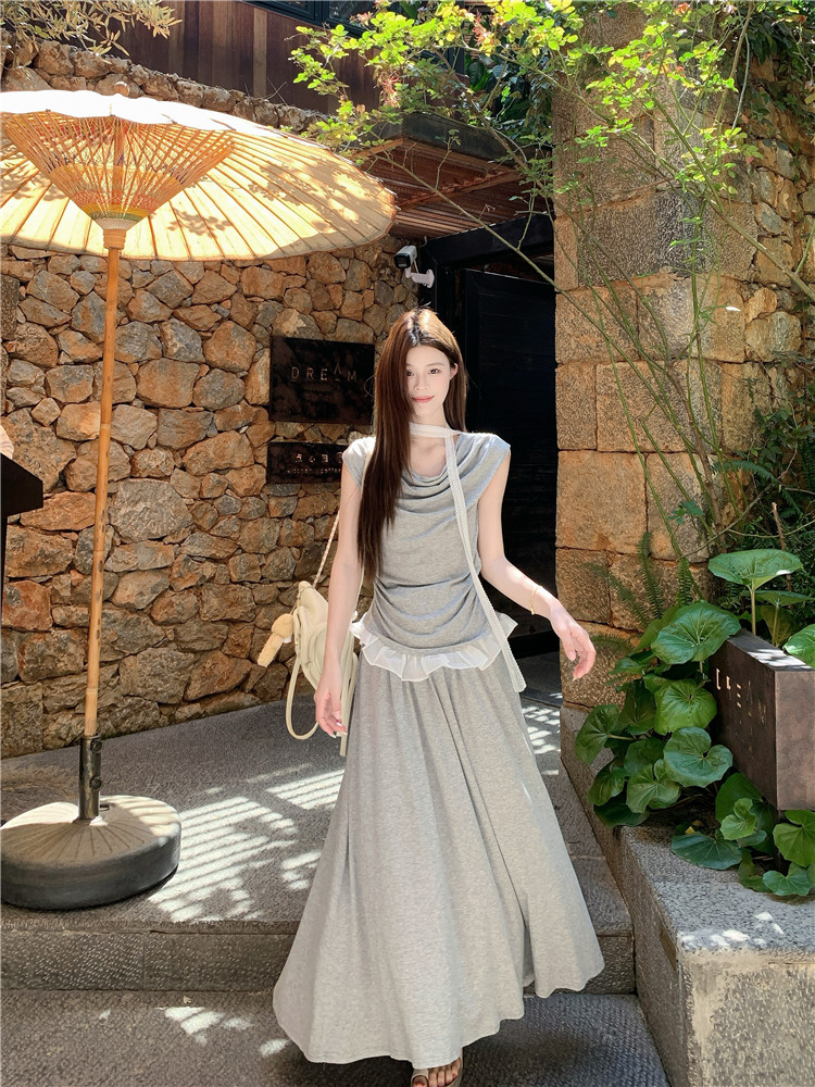 Real shot of 2025 new ruffled splicing fake two-piece sleeveless T-shirt + high-waist drooping large hem skirt two-piece set