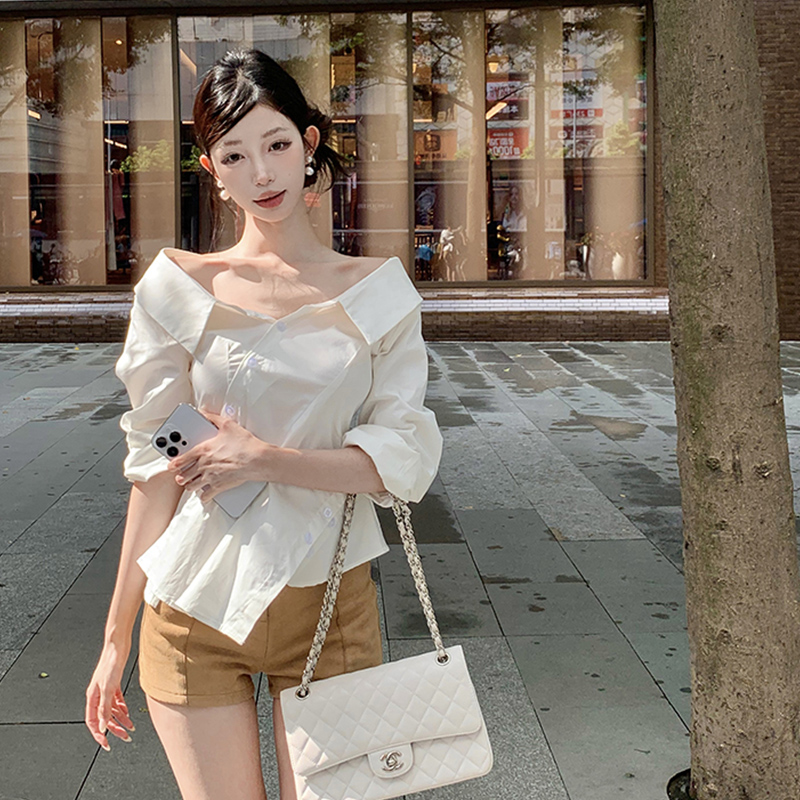 French temperament and fashion commuting one-shoulder long-sleeved shirt for women design lapel slit irregular top summer