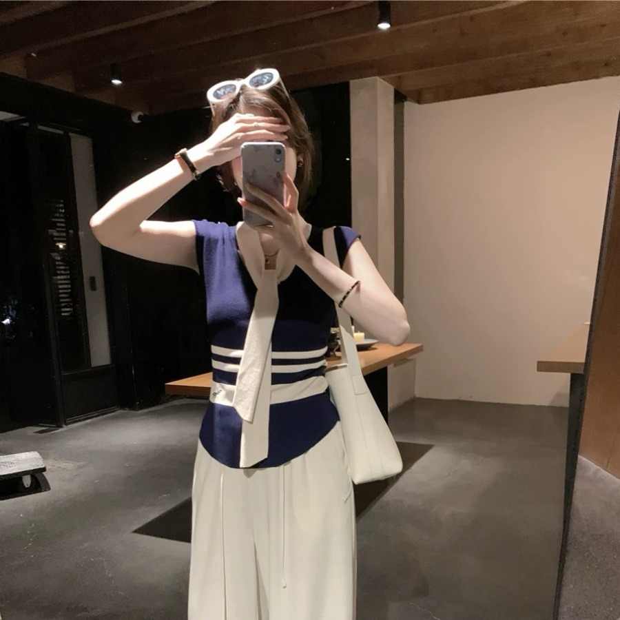 天貓質量設計感小眾帶披肩針織衫女夏季新款修身v領無袖背心