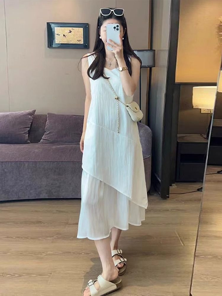白色背心吊帶連衣裙子女夏季2025新款設計感小個子高級感拼接長裙