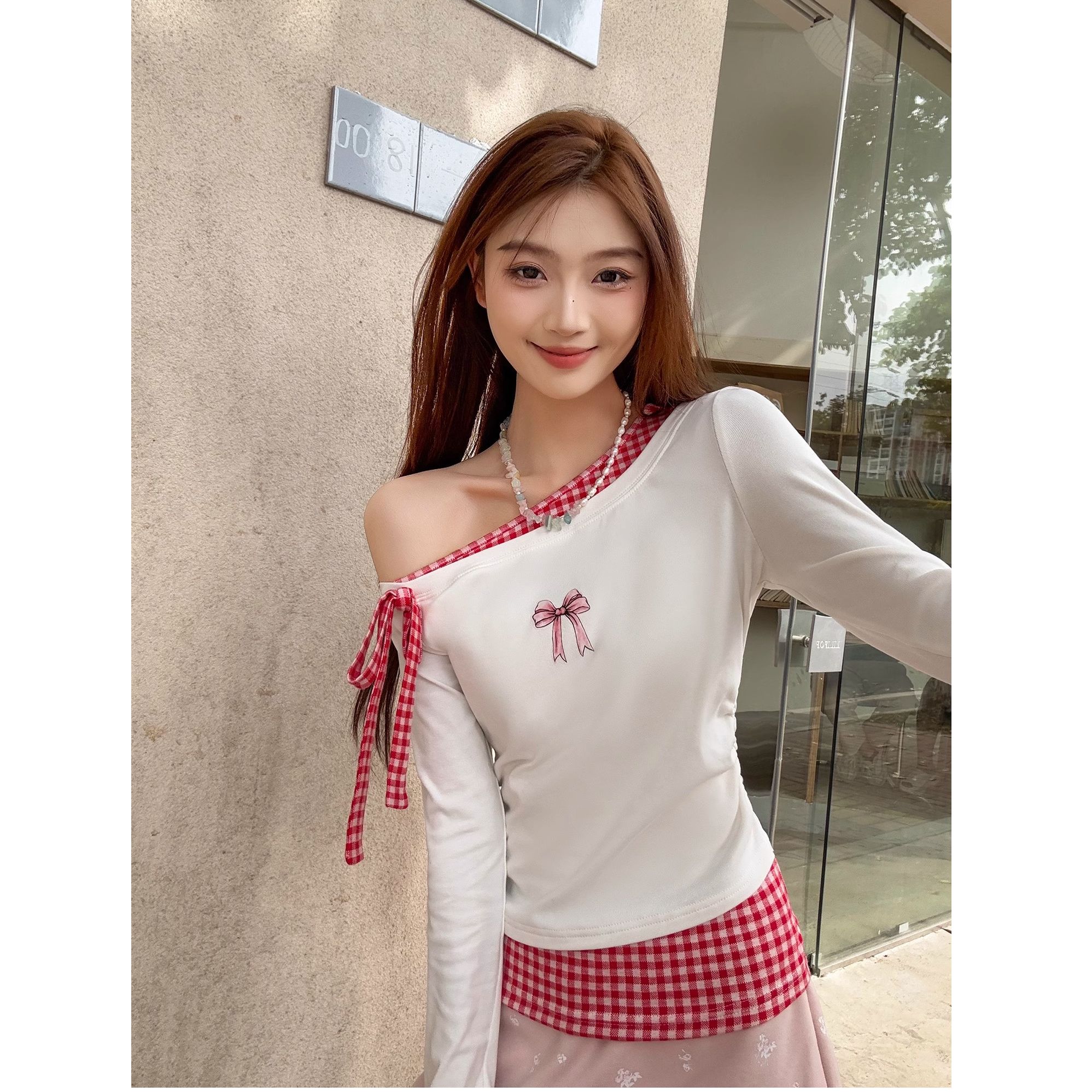 2025 summer new top design contrast color spliced ​​long-sleeved top for women