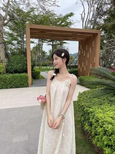 Sweet little fresh chiffon embroidered jacquard temperament suspender dress for women in summer new holiday style tassel skirt