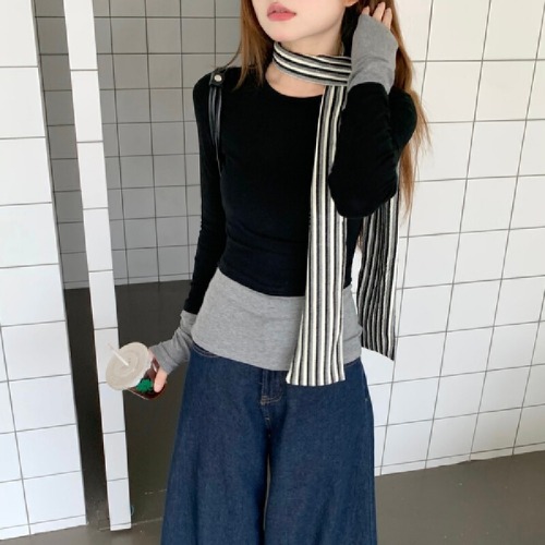Real shot of black fake two-piece contrasting long-sleeved T-shirt for women in autumn irregular wear slim T-shirt top