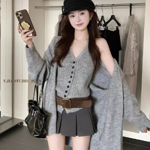 Korean-style relaxed knit cardigan jacket with halterneck strap vest—two-piece autumn/winter set featuring a premium, soft, and cozy sweater suit.