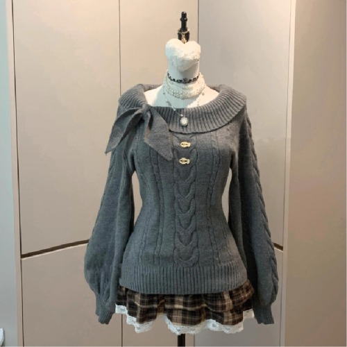 A one-shoulder rabbit ear round neck long-sleeved ancient-style knitted sweater for women, suitable for autumn and winter, elegant and sweet, versatile and stylish.
