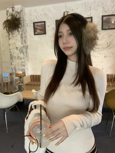 Real-shot, authentic minimalist one-piece knitwear: women's base-layer sweater—seamless, figure-flattering, and perfectly fitted for a slimming look.