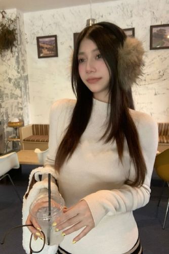 Real-shot, authentic minimalist one-piece knitwear: women's base-layer sweater—seamless, figure-flattering, and perfectly fitted for a slimming look.