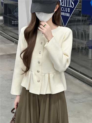 Stunningly beautiful, uniquely chic, soft and elegant, high-end knit top, professionally shot