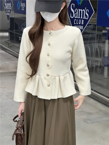 Stunningly beautiful, uniquely chic, soft and elegant, high-end knit top, professionally shot