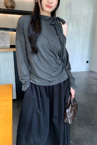 The photo-realistic image features a stunning white sleeveless off-shoulder top with a neck tie, creating a chic look. The crop top has long sleeves and accentuates the waist beautifully.