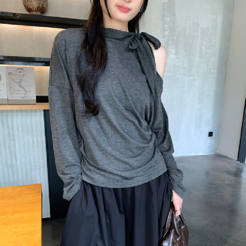 The photo-realistic image features a stunning white sleeveless off-shoulder top with a neck tie, creating a chic look. The crop top has long sleeves and accentuates the waist beautifully.