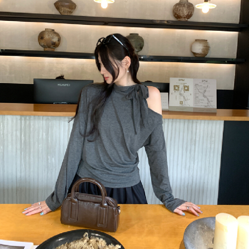 The photo-realistic image features a stunning white sleeveless off-shoulder top with a neck tie, creating a chic look. The crop top has long sleeves and accentuates the waist beautifully.