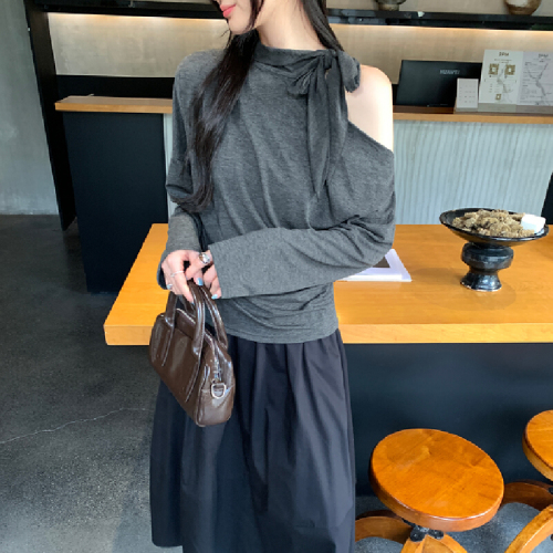 The photo-realistic image features a stunning white sleeveless off-shoulder top with a neck tie, creating a chic look. The crop top has long sleeves and accentuates the waist beautifully.