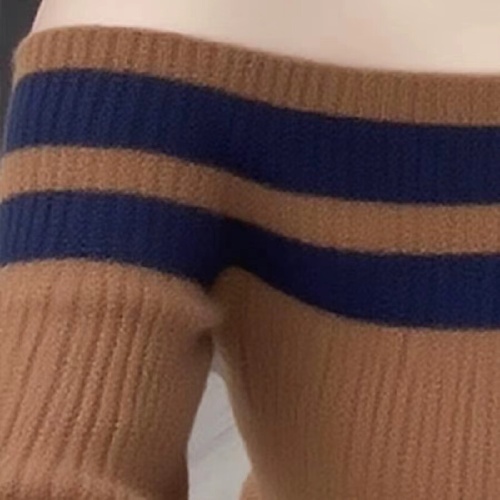 Korean-style early autumn outfit, incredibly stylish, light mature top, unique small design, beautiful faux two-piece striped knitwear for women