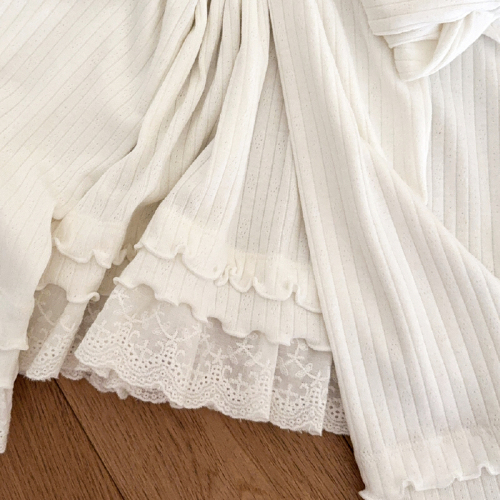 Official Image: 29% Cotton, 63% Polyester, 8% Spandex Pit-Striped, Straight Shoulder, Lace Edge Hem, Long Sleeve Underwear Top