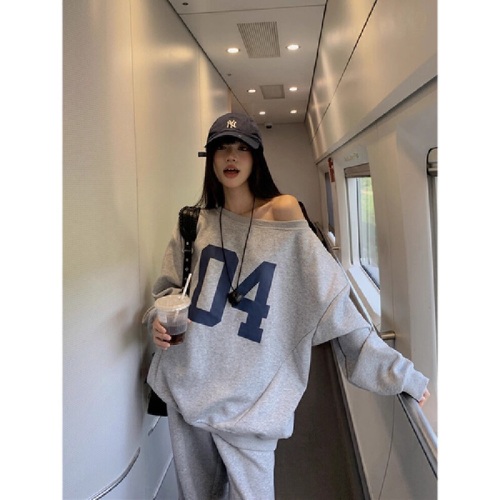 Loose, high-end off-shoulder hoodie with wide-leg trousers—two-piece set